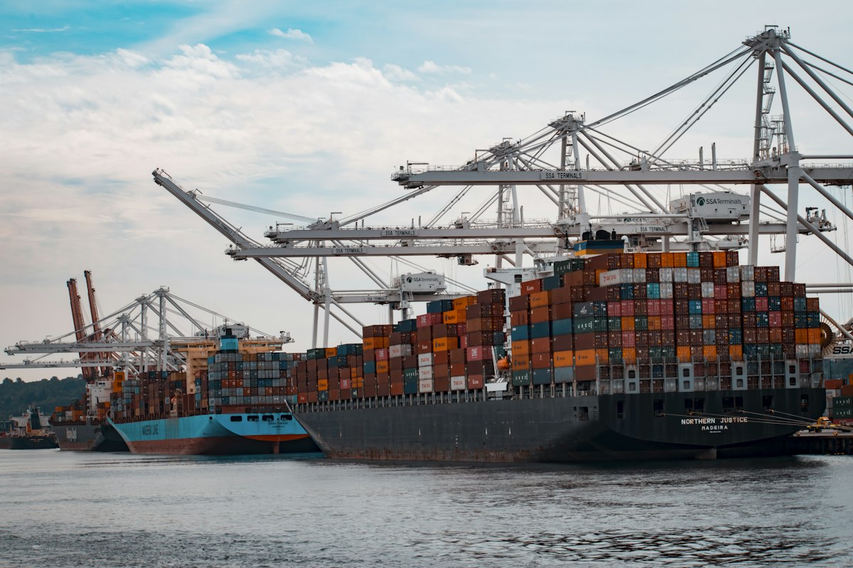 International cargo container hub handling raw cashew nut procurement between Africa and Asia